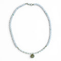 Lunaria sterling silver necklace with white chalcedony, freshwater rice pearls, green aventurine and a hammered sterling silver coin pendant